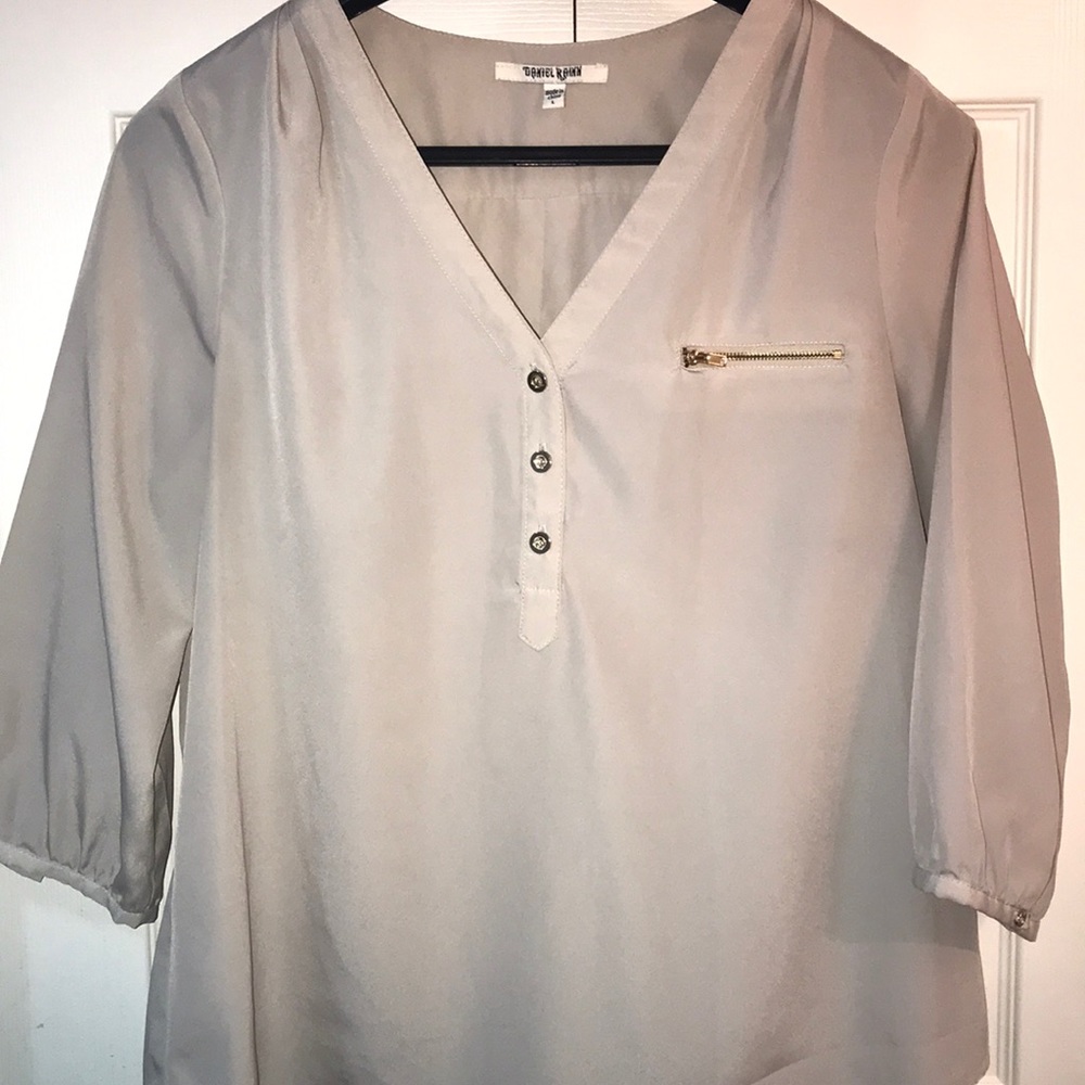 Tan 3/4 sleeve blouse with gold accents